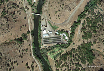 aerial view of hatchery roads, buildings, ponds © 2015 Google