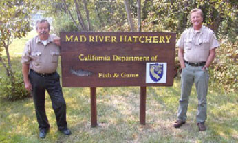 hatchery staff and sign
