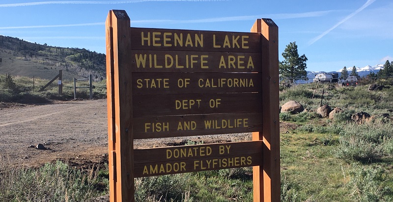 Heenan Lake Wildlife Area wooden sign that greets visitors to the area in Alpine County.
