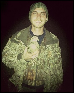 Ian holds a wild hen pheasant trapped at night at the Yolo Bypass Wildlife Area as part of his extensive research into California’s wild pheasant populations.
