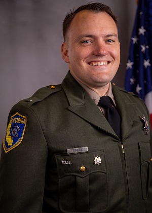 Formal portrait of CDFW Lt. Trevor Pell