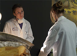 Forensic Specialist Kelly Carrothers (l) prepares to collect tusk samples at the La Brea Tar Pits, in Los Angeles.