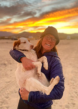 Scientist Paige Prentice holding her dog