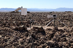 monitoring equipment on the beaches of the Salton Sea with mountains in background