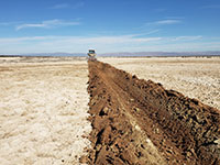ditch in sand on the Salton Sea