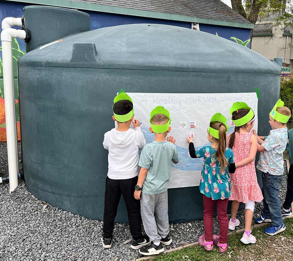 Rainwater harvesting systems were installed in 2025 and 2026 at community centers within priority coho salmon and steelhead watersheds, including elementary schools, retreat centers and community gardens. Courtesy photo