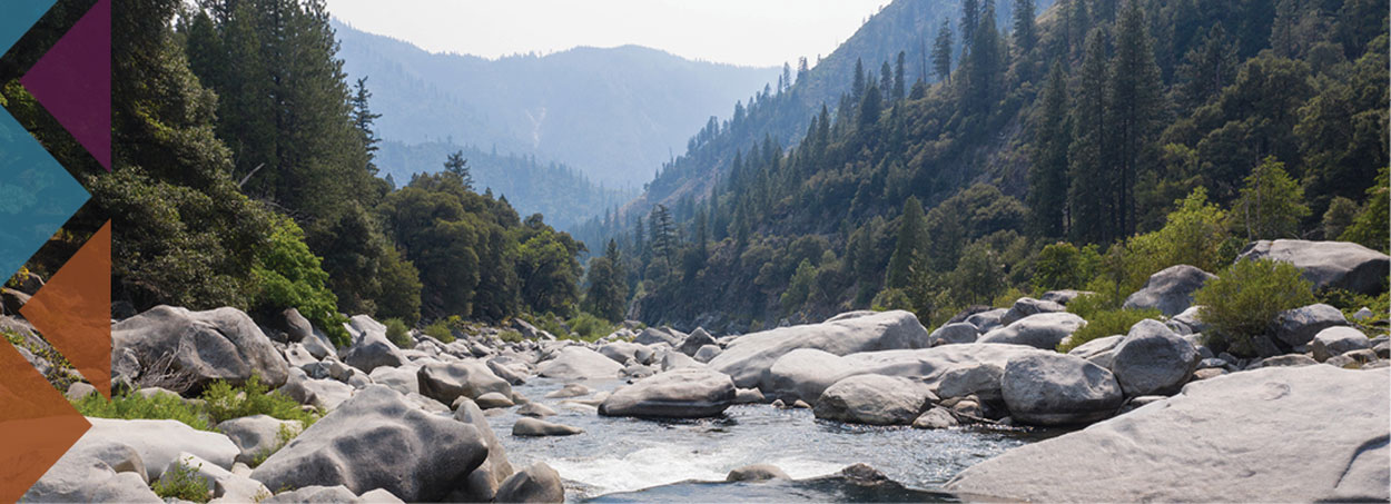 river valley, forested mountains