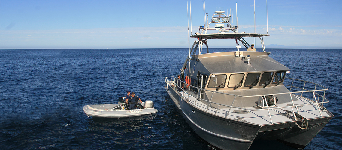 CDFW LED officers and boat