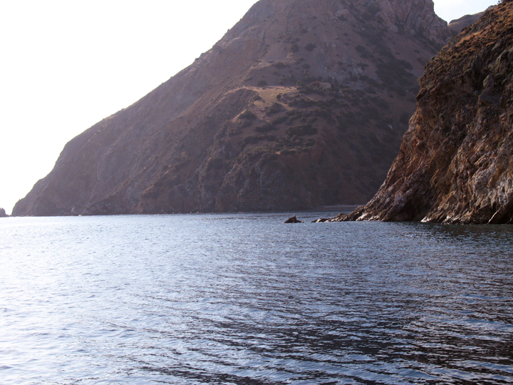 view of tall headland from the water