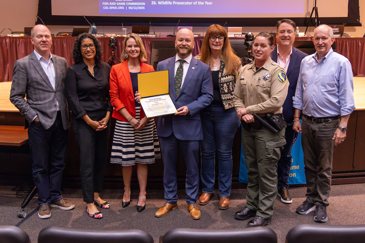 Caption: The California Fish and Game Commission named Butte County Deputy District Attorney Michael Tufaro the 2024 Wildlife Prosecutor of the Year. Pictured at the Commission’s June 12 meeting in Sacramento from left are CDFW Director Charlton Bonham, Commission President Erika Zavaleta, Vice President Samantha Murray, Deputy District Attorney Michael Tufaro, Commissioner Jacque Hostler-Carmesin, CDFW Law Enforcement Division Deputy Chief Erica Manes and commissioners Darius Anderson and Eric Sklar. Photo by Travis VanZant/California Department of Fish and Wildlife