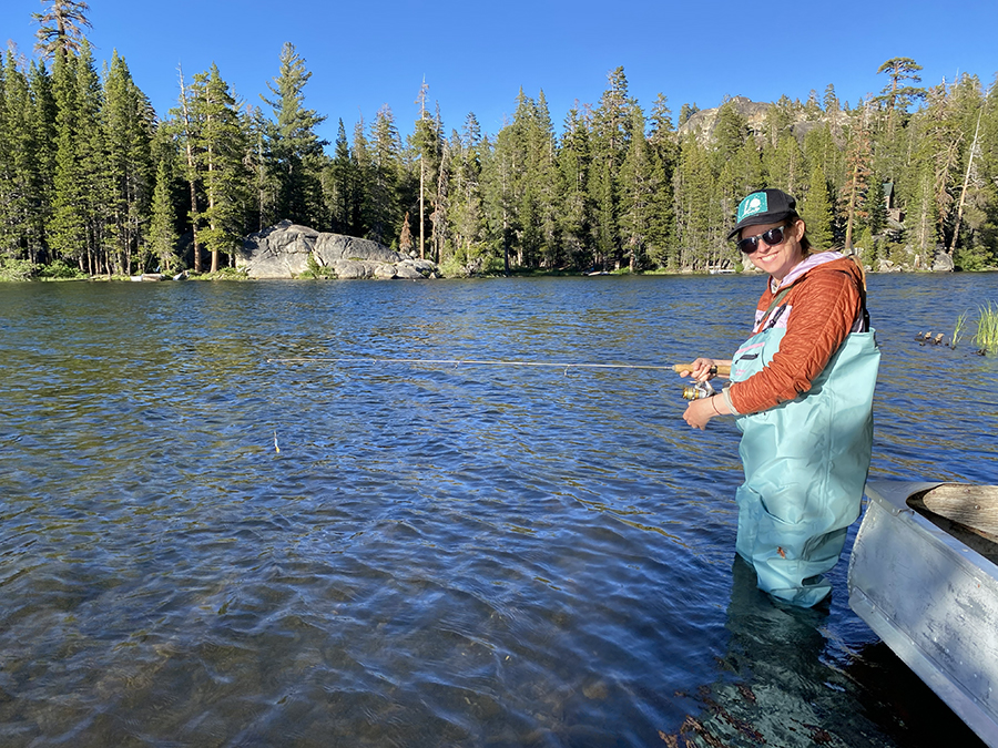 Woman fishing in lake. CDFW photo