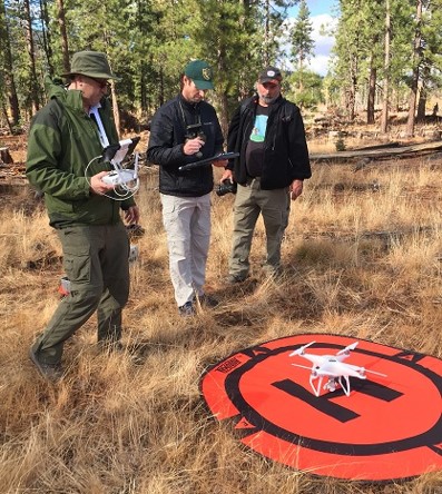 CDFW staff operating a drone