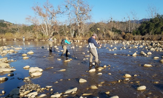 Staff surveying the Ventura River mainstem using RTK
