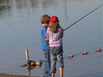 boy and girl fishing