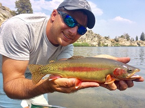 Image of Michael Mamola holding a California Golden Trout.