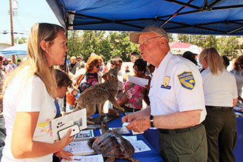 volunteer communicating with public