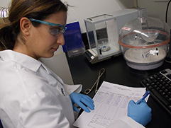Inorganics laboratory chemist completing benchsheet