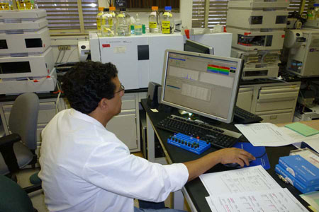 Water Pollution Control Lab scientist analyzing data.