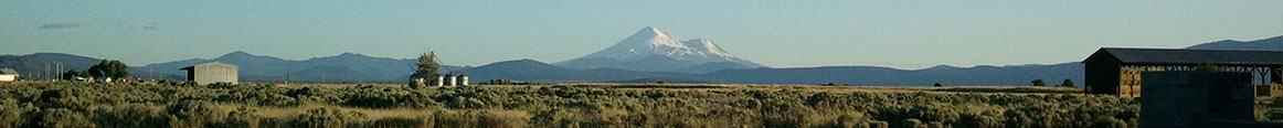 view of Mount Shasta over farmland