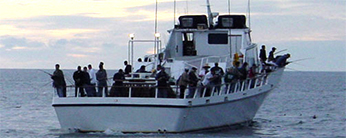 anglers aboard a commercial passenger fishing vessel at sea